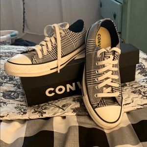 Converse sneakers and black and white apron